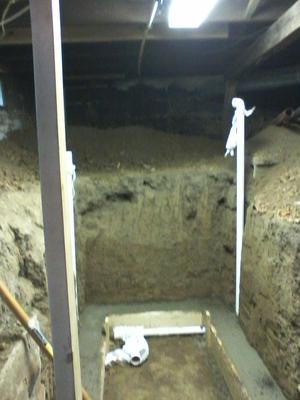 Pipe in the access area with collection gravel to be installed under a slab