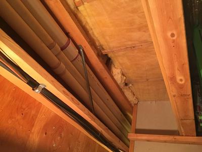 4-inch PVC pipe ran through basement rafters to garage next to existing furance vents